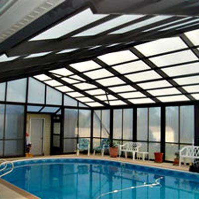 swimming pool inside a gazebo enclosure