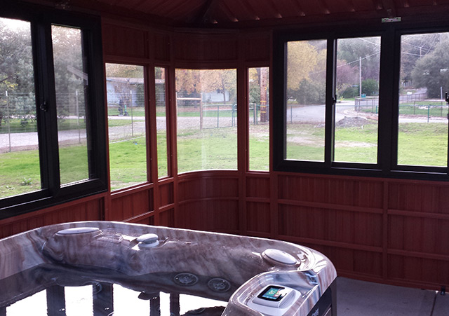 view from inside a hot tub enclosure